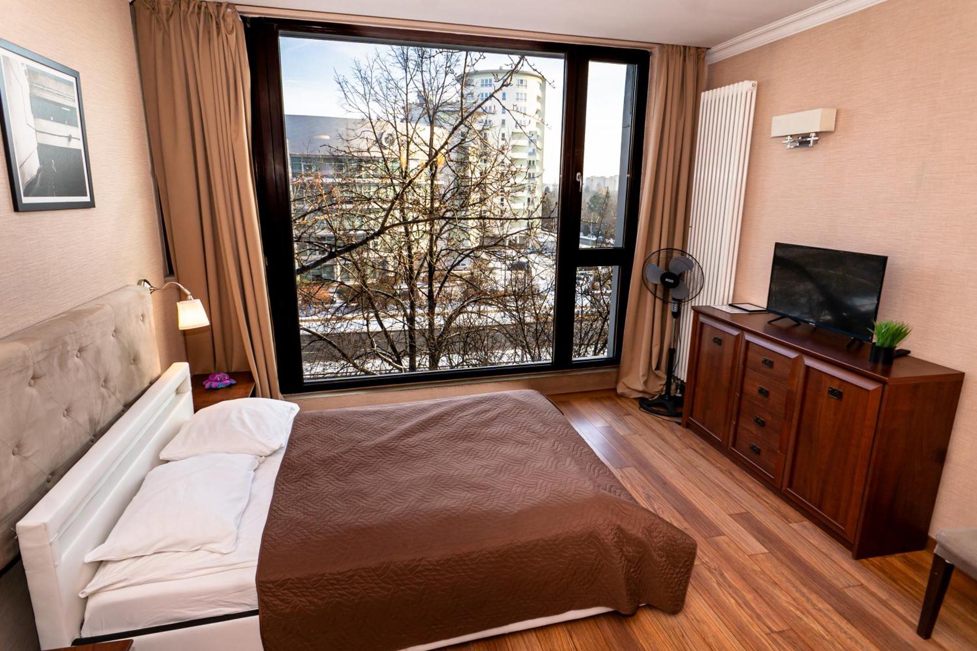 Triton Apartments In Варшава Номер фото
