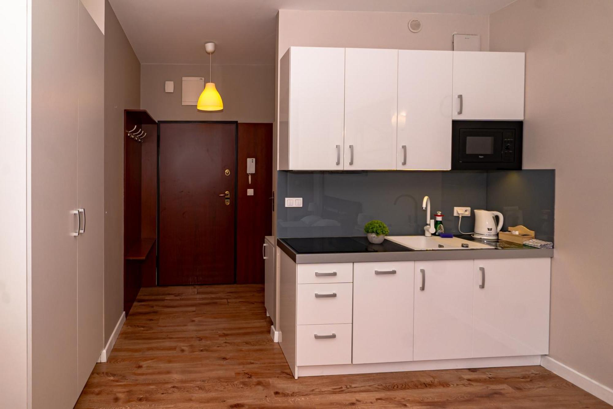 Triton Apartments In Варшава Номер фото